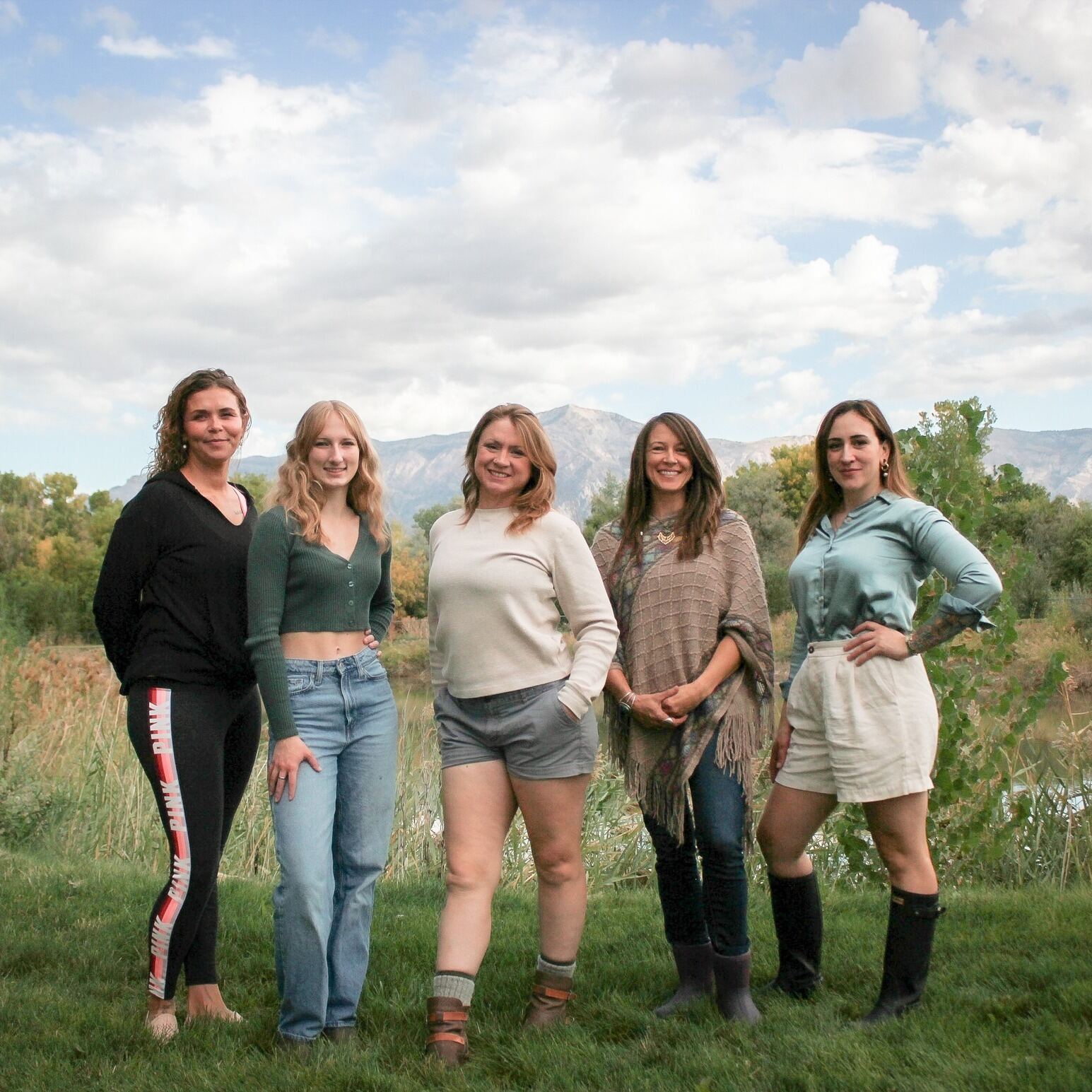The Urban Prairie team standing together with the Wasatch in the background